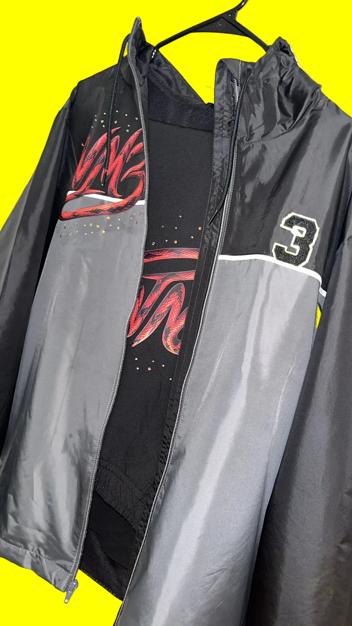 Python “NM3” windbreaker track suit
